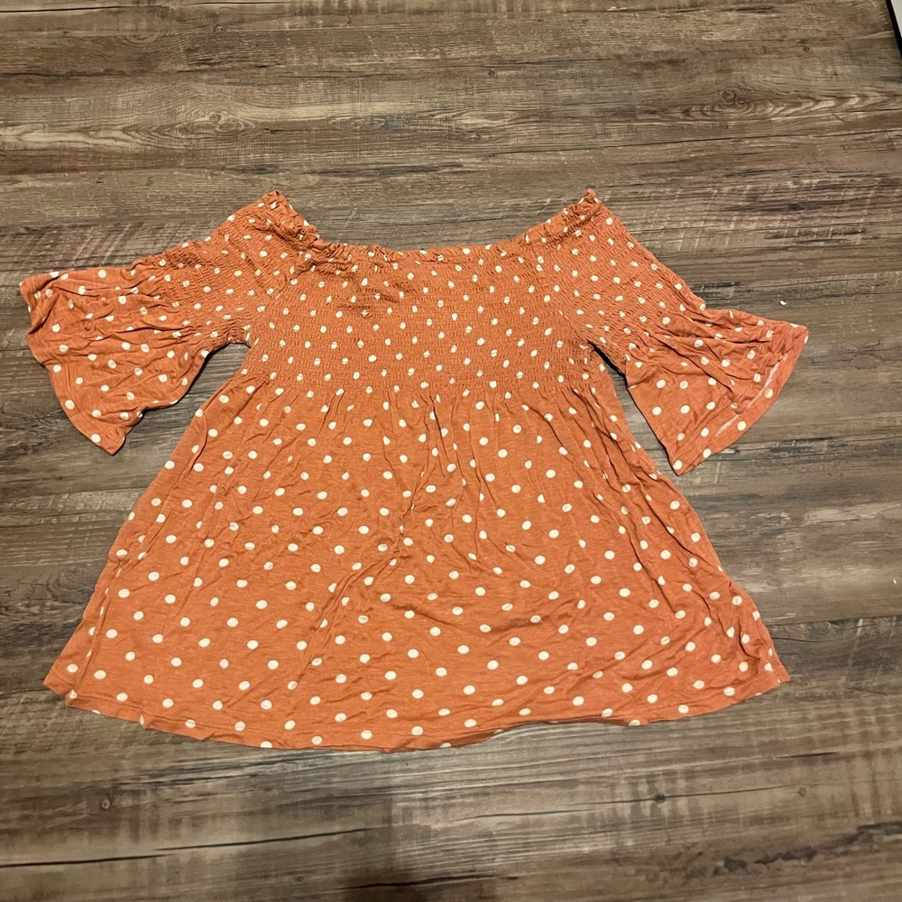 Women’s Orange and White polka dotted shirt from REWIND size: S